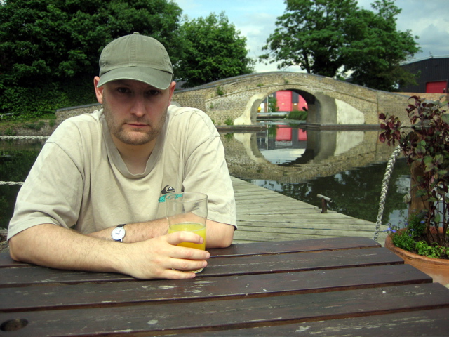 Tom enjoys a drink